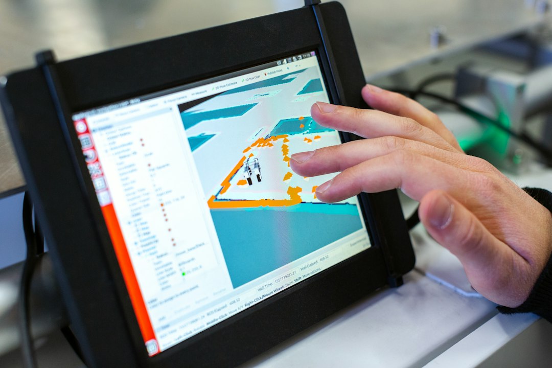 A professionally dressed person closely examining a complex architectural wireframe on a glowing tablet in a modern, minimalist setting, representing an expert audit.